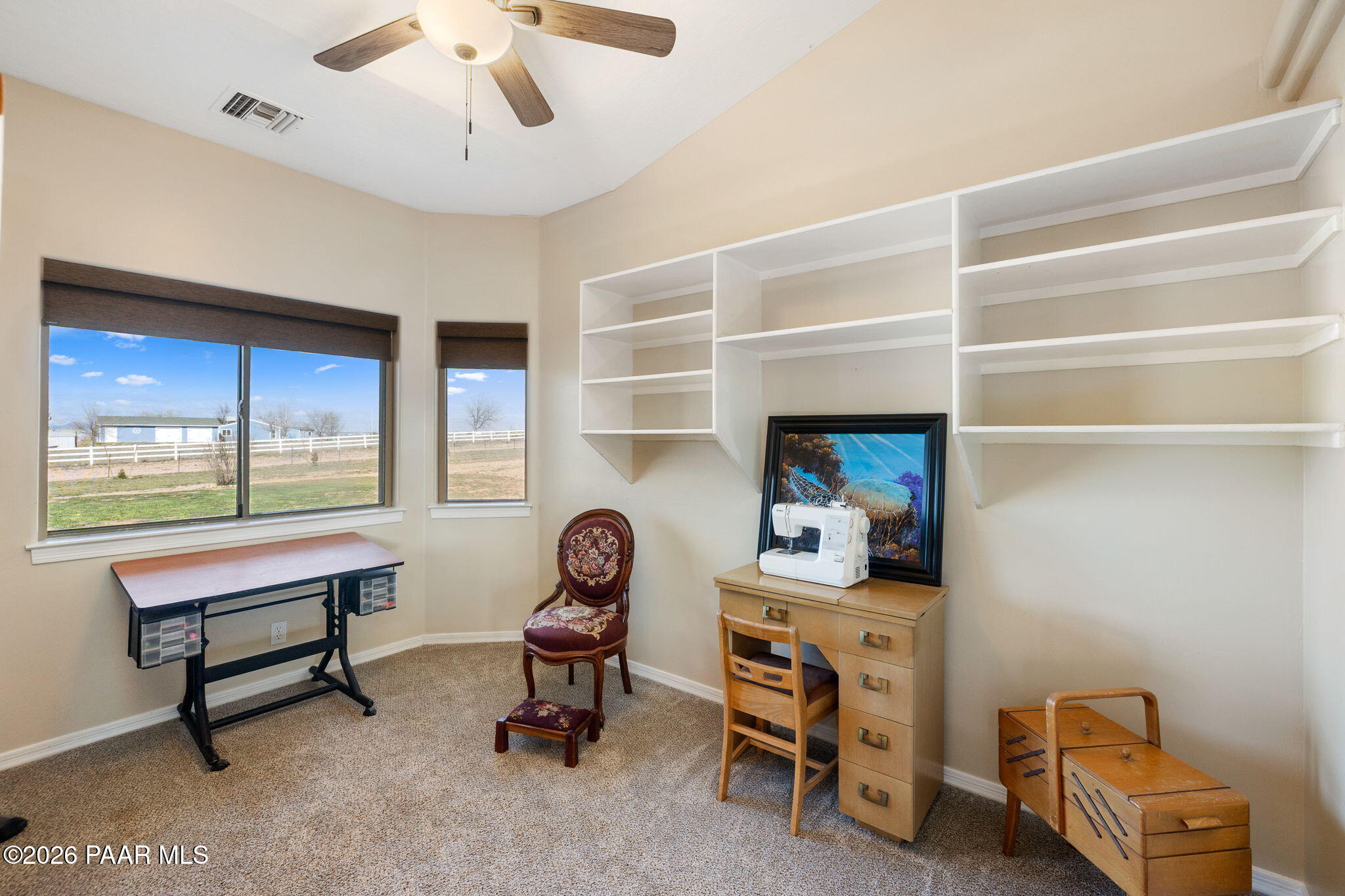 26455 North Bull Snake Road Paulden, AZ 86334 - Photo 5 of 40 a room with a desk and a workspace
