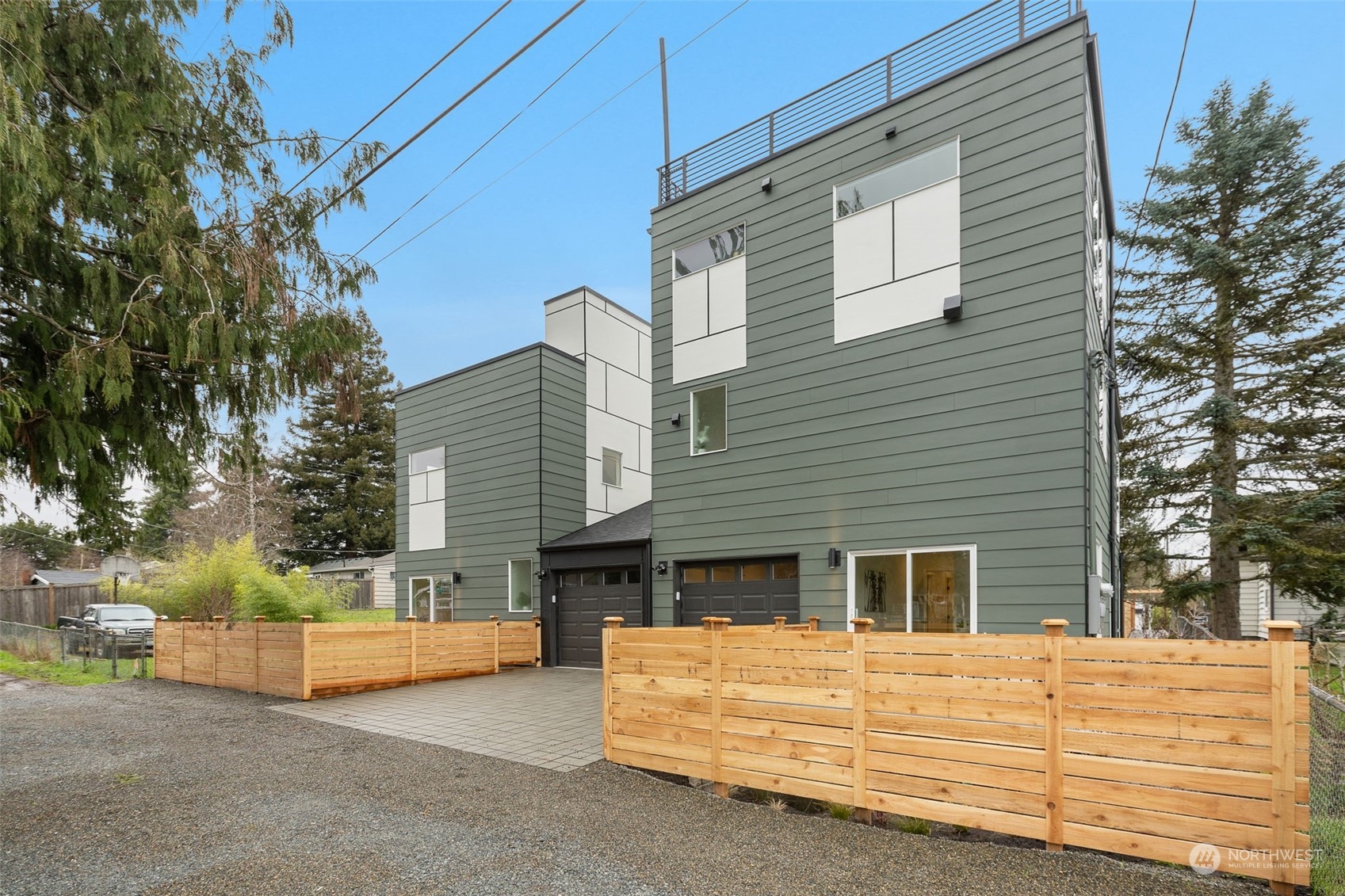 8849 30th Avenue Southwest Seattle, WA 98126 - Photo 36 of 37 a view of a house with a yard