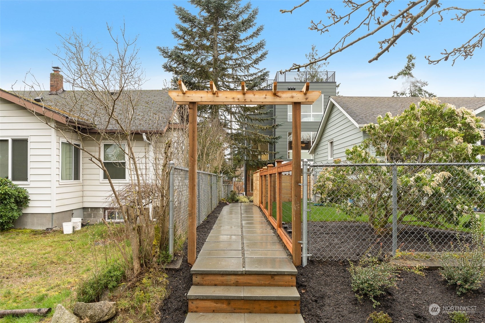 8849 30th Avenue Southwest Seattle, WA 98126 - Photo 4 of 37 a view of a pathway of house