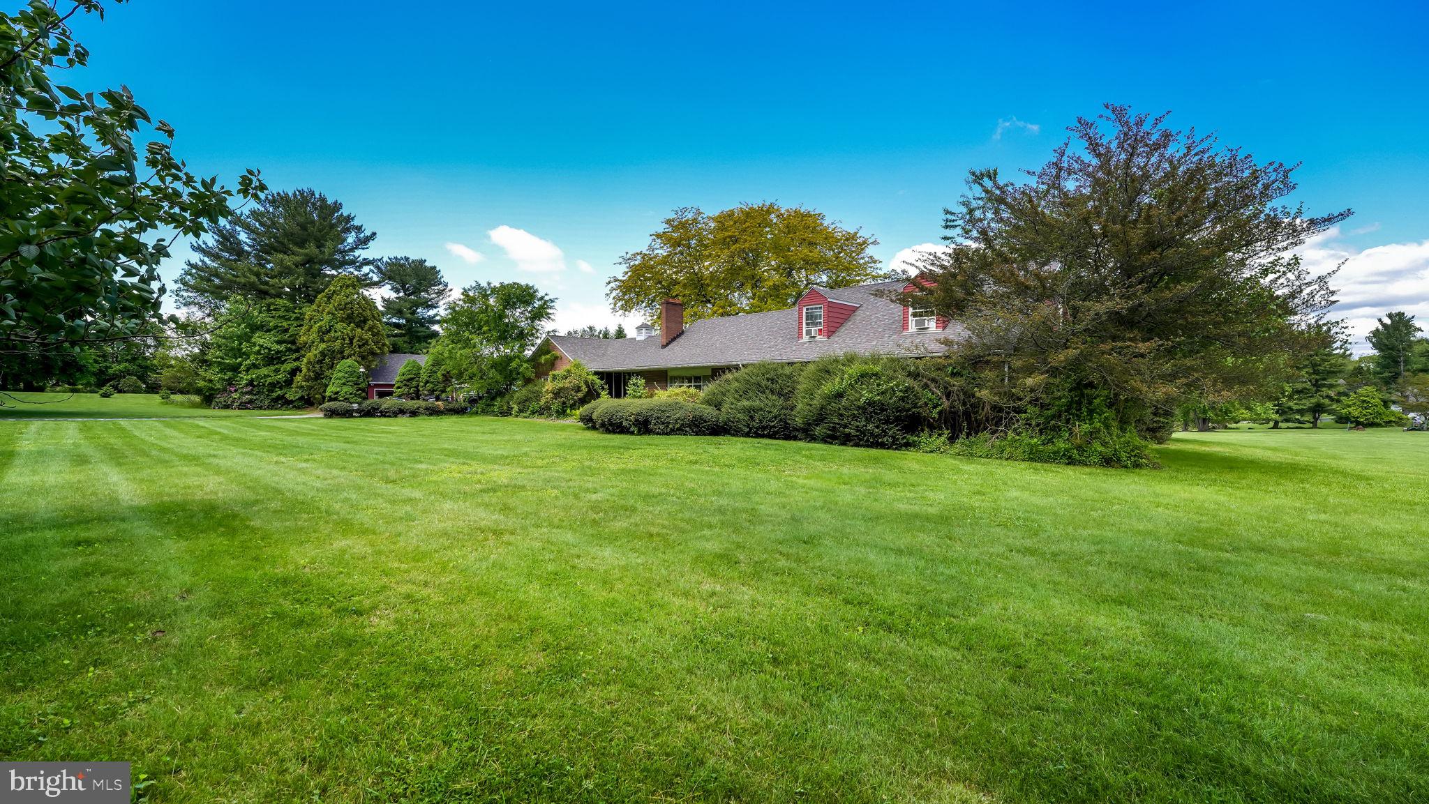 1591 Middletown Road Glen Mills, PA 19342 - Photo 3 of 55 a backyard of a house with lots of green space