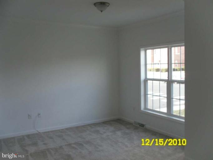 1311 Sulphur Spring Road Halethorpe, MD 21227 - Photo 12 of 16 an empty room with a window