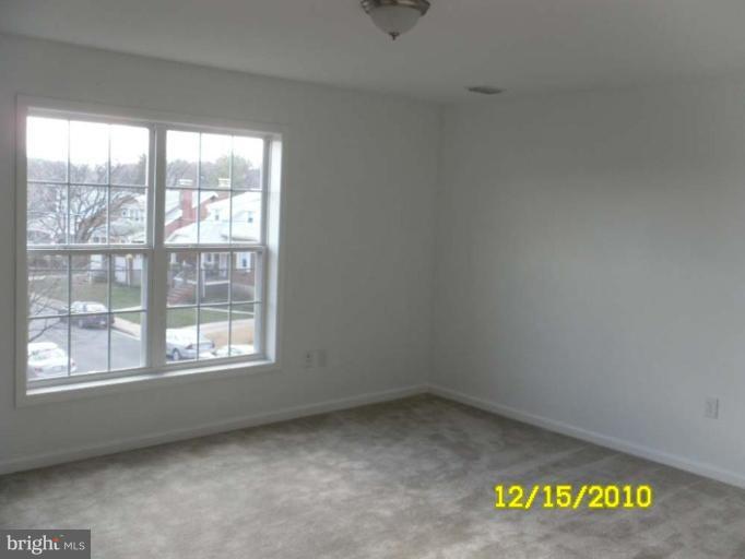 1311 Sulphur Spring Road Halethorpe, MD 21227 - Photo 6 of 16 an empty room with a window
