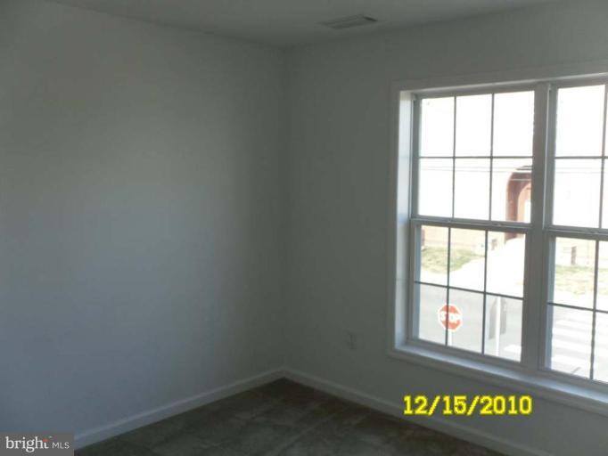 1311 Sulphur Spring Road Halethorpe, MD 21227 - Photo 7 of 16 an empty room with a window