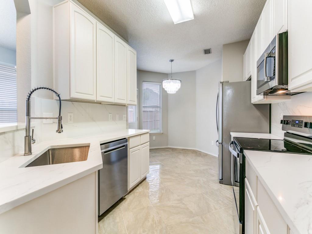 2225 Starleaf Place Flower Mound, TX 75022 - Photo 9 of 23 Kitchen & Breakfast Area.