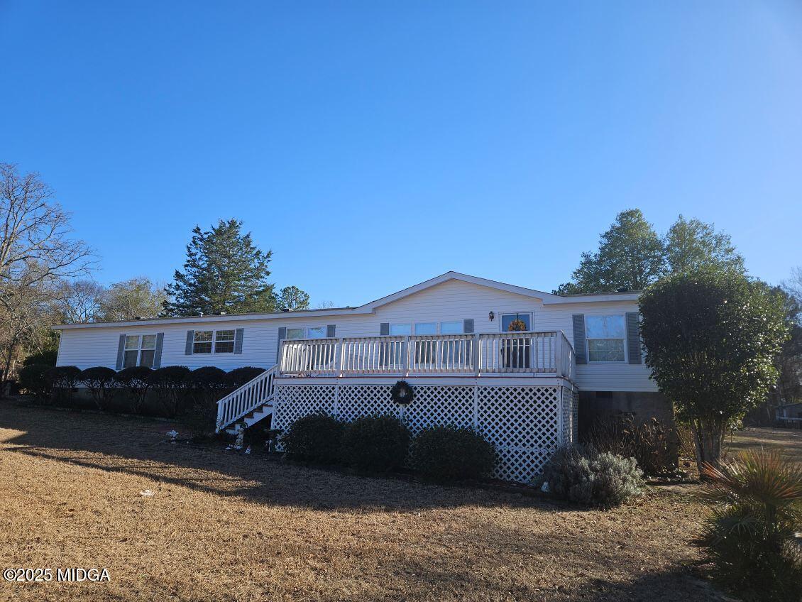 163 Spring Valley Drive Byron, GA 31008 - Photo 1 of 62 a view of a house with a roof yard