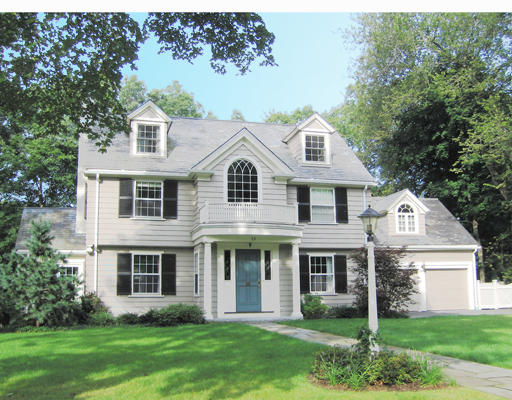 53 Damien Road Wellesley, MA 02481 - Photo 1 of 1 a front view of a house with a garden and trees
