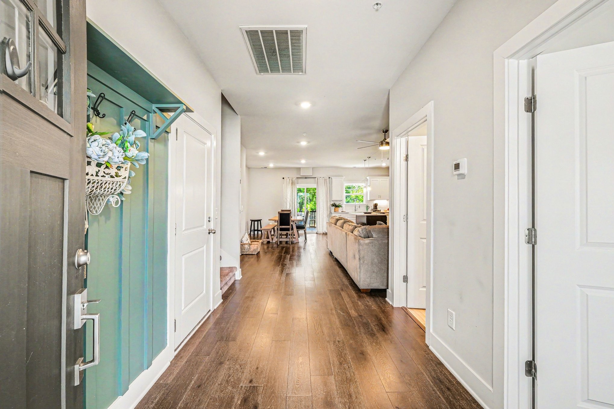 1144 Lock 4 Road, Unit H3 Gallatin, TN 37066 - Photo 3 of 22 a view of a hallway with wooden floor windows and a livingroom