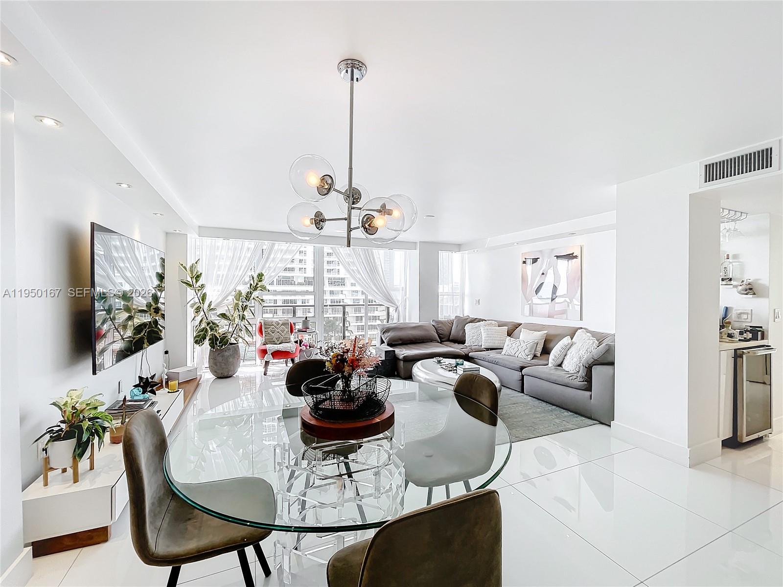 600 Northeast 36th Street, Unit 703 Miami, FL 33137 - Photo 15 of 48 a view of a dining room and livingroom furniture