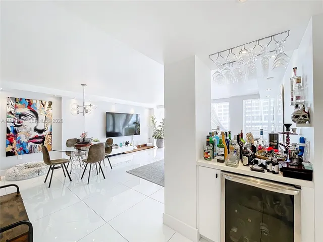 a view of a hallway and dining room