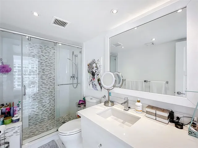 a view of a hallway with washer and dryer