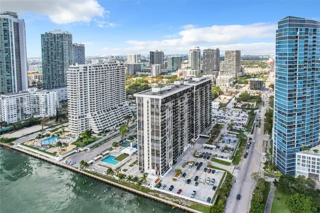 a view of a city with tall buildings