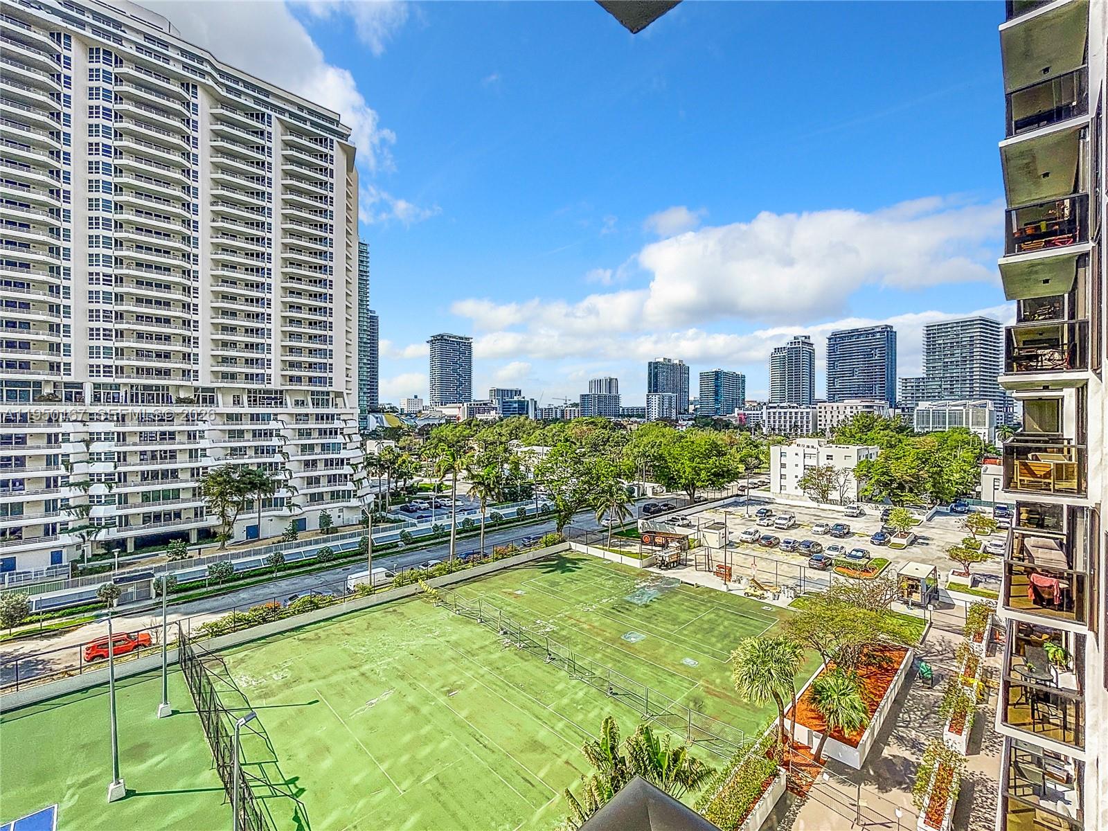 600 Northeast 36th Street, Unit 703 Miami, FL 33137 - Photo 41 of 48 a view of a house with swimming pool