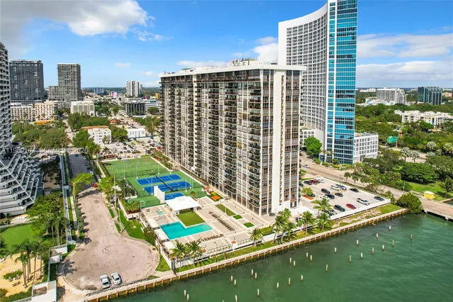 a view of a city with tall buildings