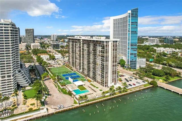 a view of city with ocean