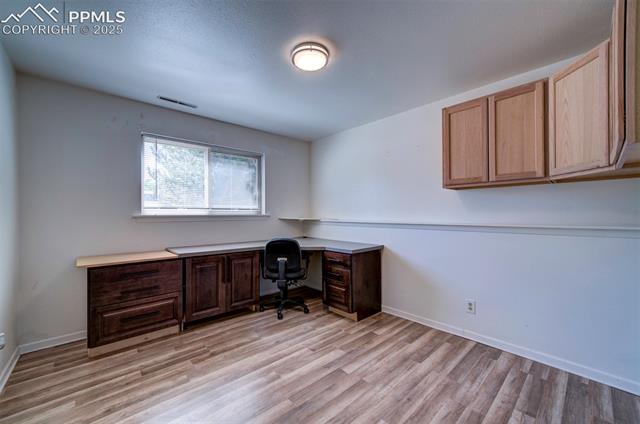 3870 Half Turn Road Colorado Springs, CO 80917 - Photo 30 of 34 Office area featuring light wood-style flooring and baseboards