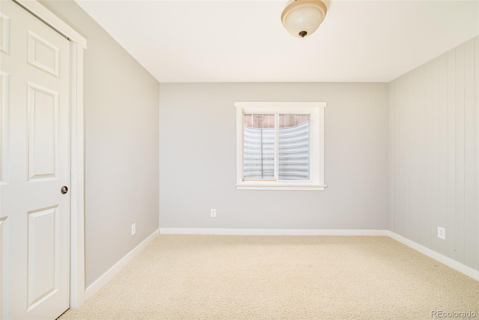 2147 Pinon Circle Erie, CO 80516 - Photo 22 of 34 an empty room with a window