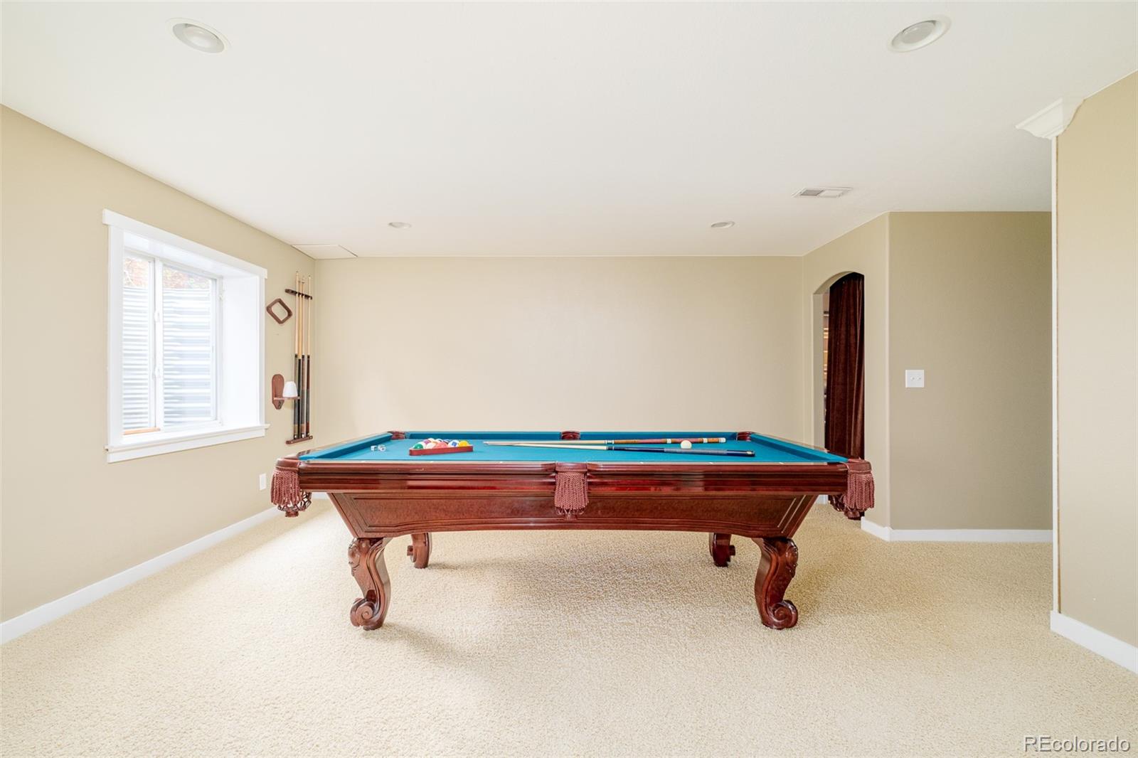 2147 Pinon Circle Erie, CO 80516 - Photo 24 of 34 a room with pool table and windows