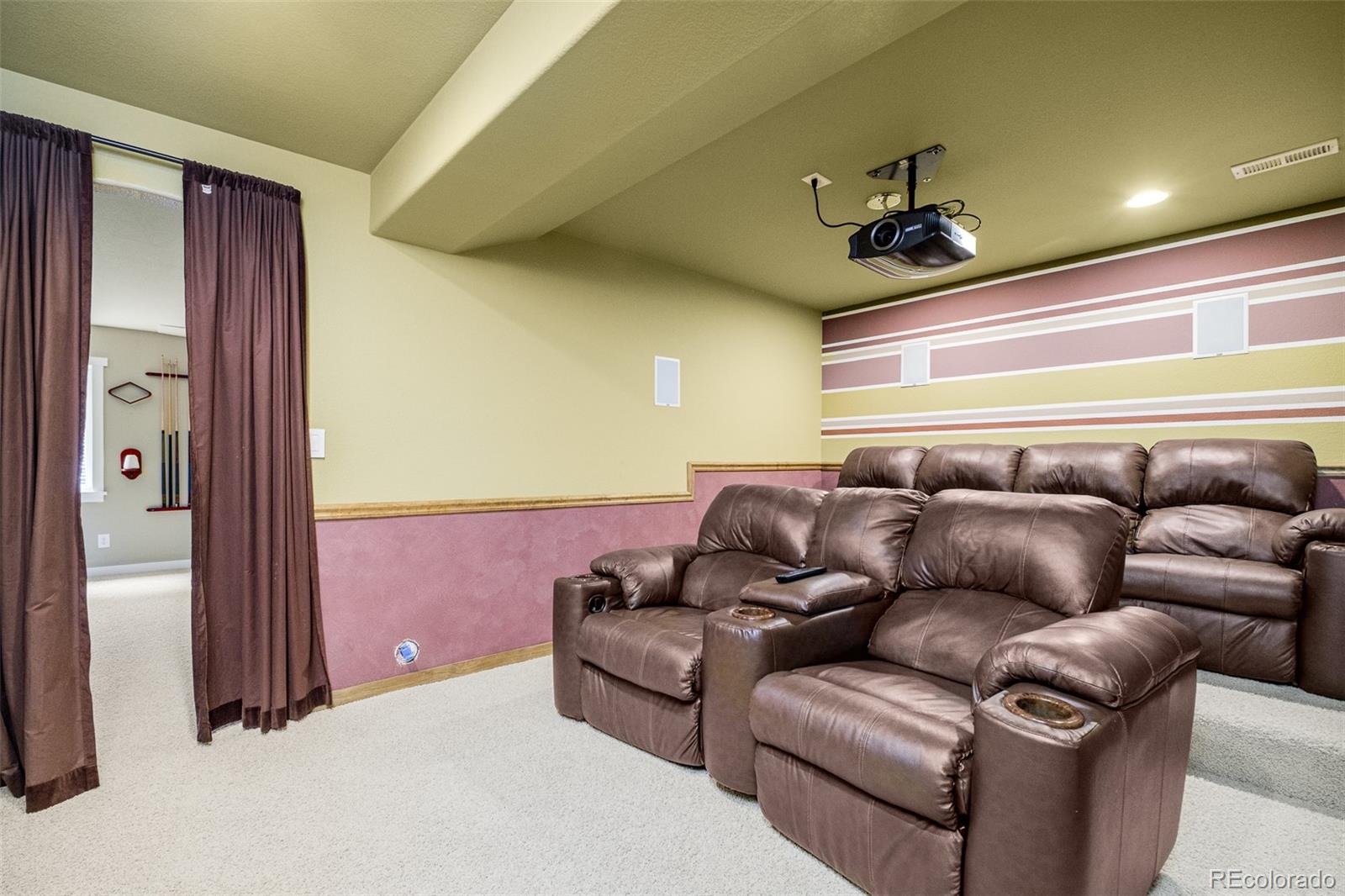 2147 Pinon Circle Erie, CO 80516 - Photo 25 of 34 a living room with furniture and a ceiling fan