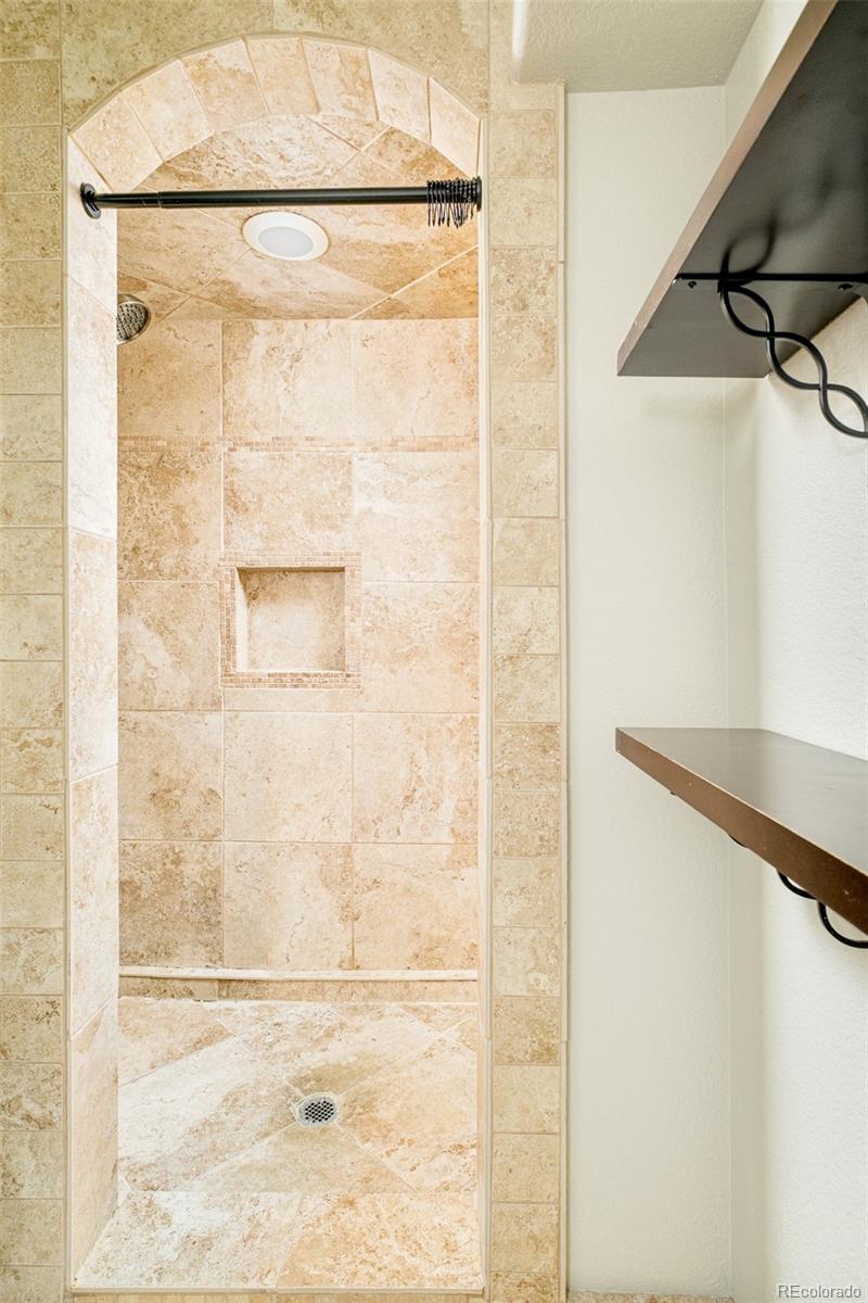 2147 Pinon Circle Erie, CO 80516 - Photo 29 of 34 a bathroom with a shower