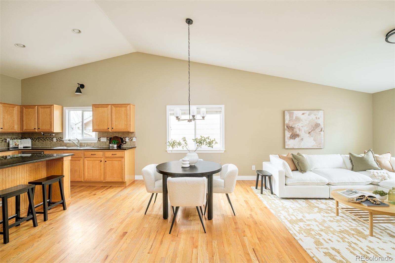 2147 Pinon Circle Erie, CO 80516 - Photo 6 of 34 a living room with furniture and a wooden floor