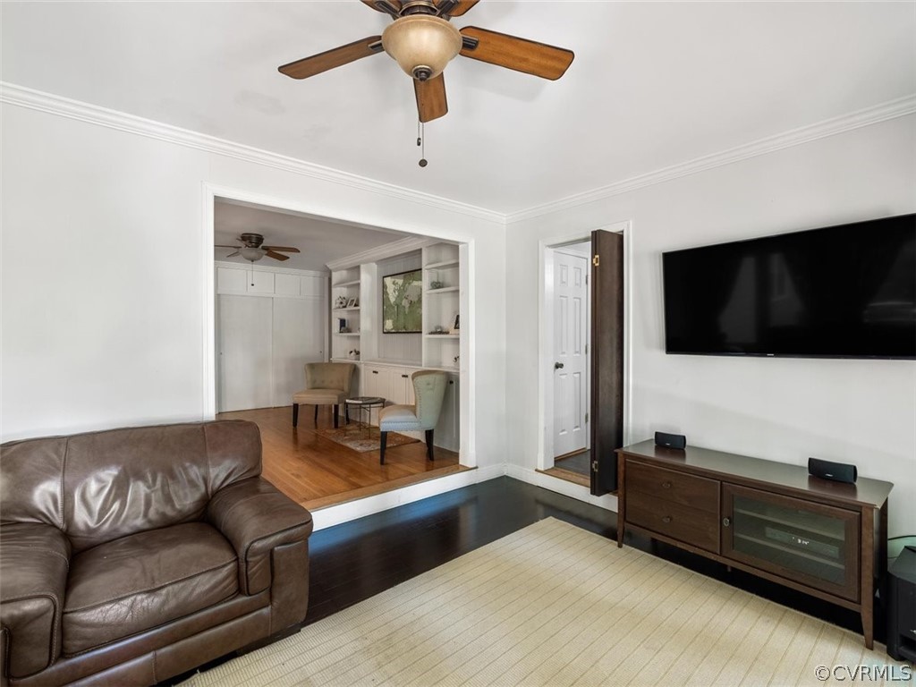 7540 Marilea Road Richmond, VA 23225 - Photo 17 of 35 a living room with furniture and a flat screen tv