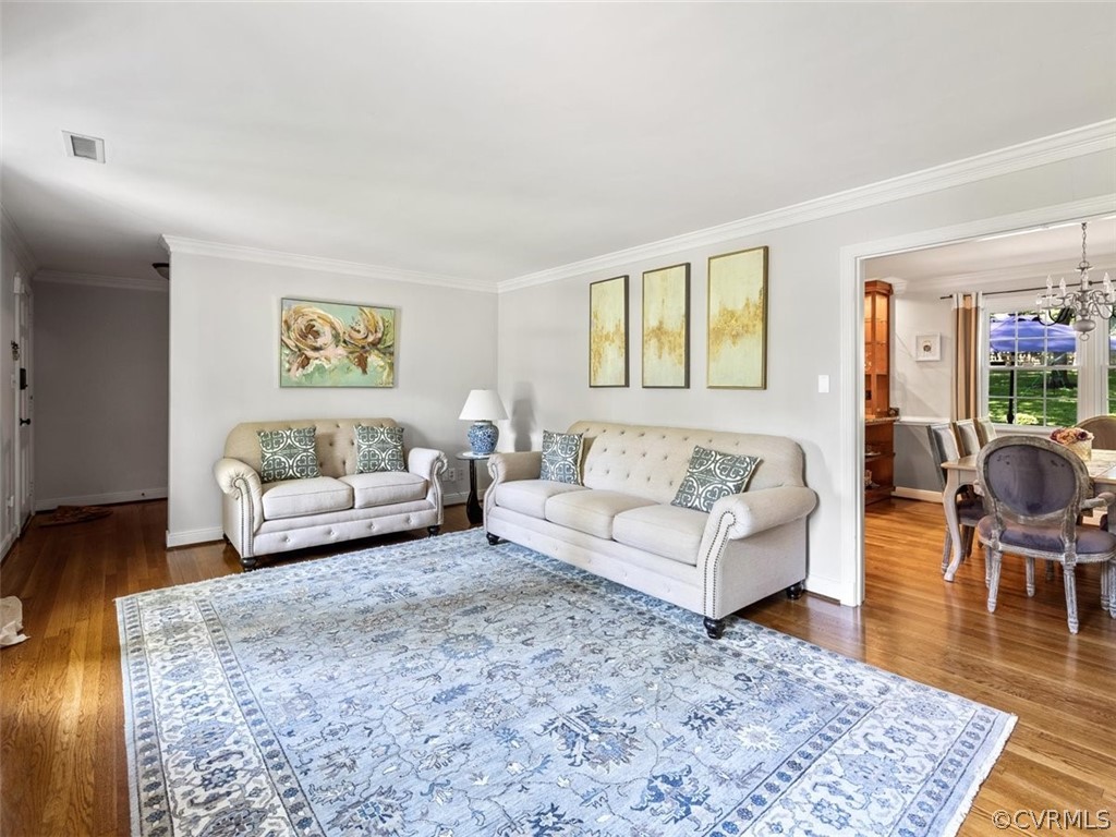 7540 Marilea Road Richmond, VA 23225 - Photo 5 of 35 a living room with furniture and wooden floor