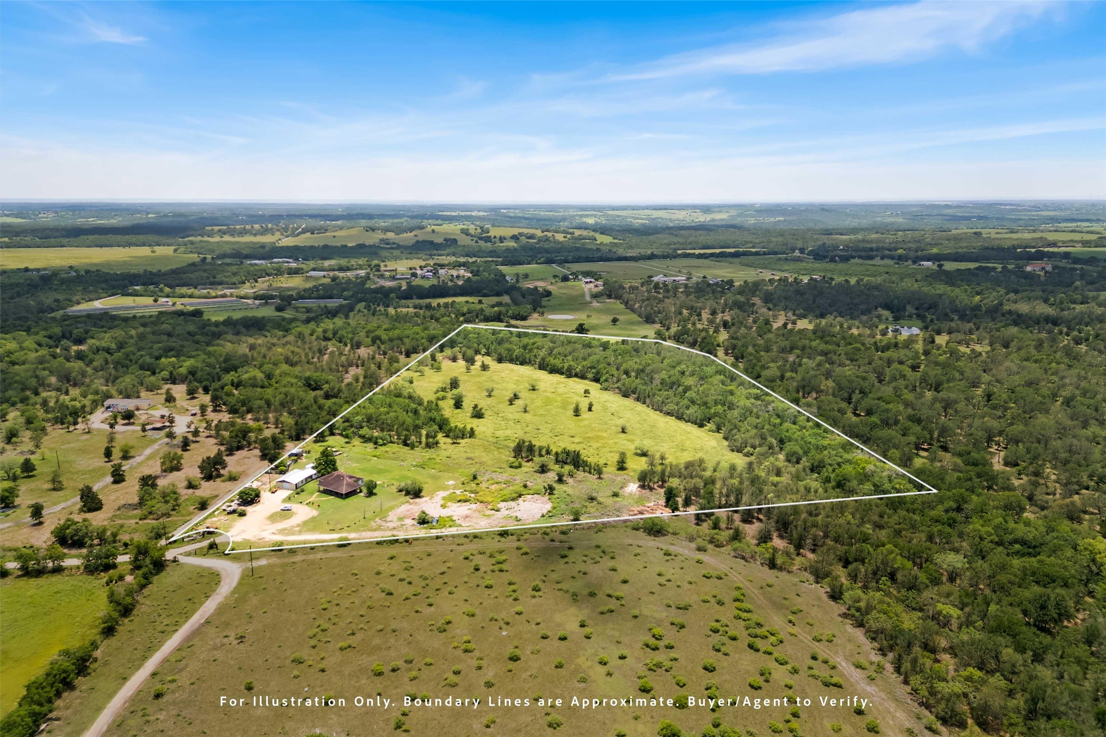 12212 Ballerstedt Road Elgin, TX 78621 - Photo 34 of 39 Overview of rural landscape with a forest and property parcel outlined