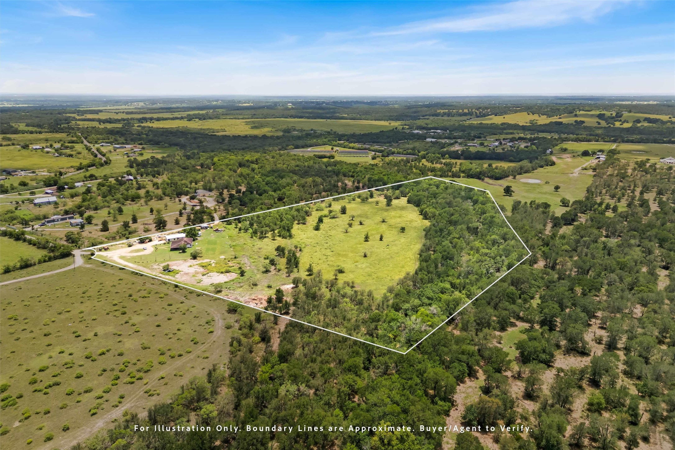 12212 Ballerstedt Road Elgin, TX 78621 - Photo 36 of 39 Overview of rural landscape with property boundaries highlighted and a forest