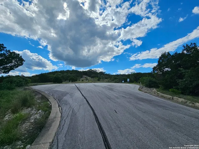 a view of a street with an outdoor space