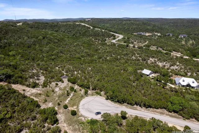 a view of a city and mountains