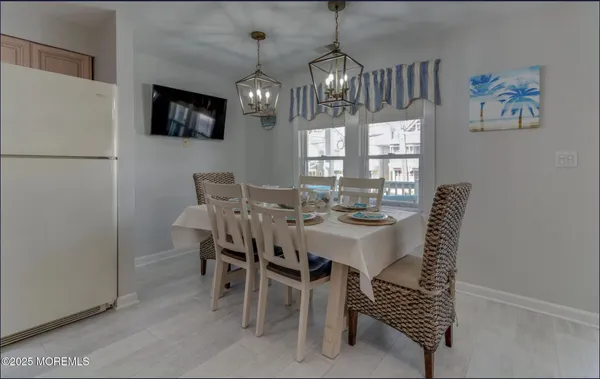 a view of a dining room with furniture