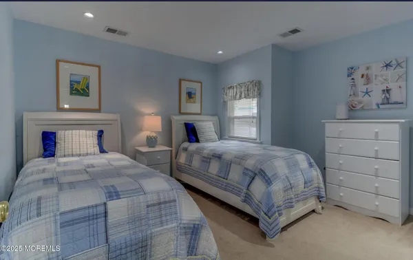 a bedroom with a bed and closet