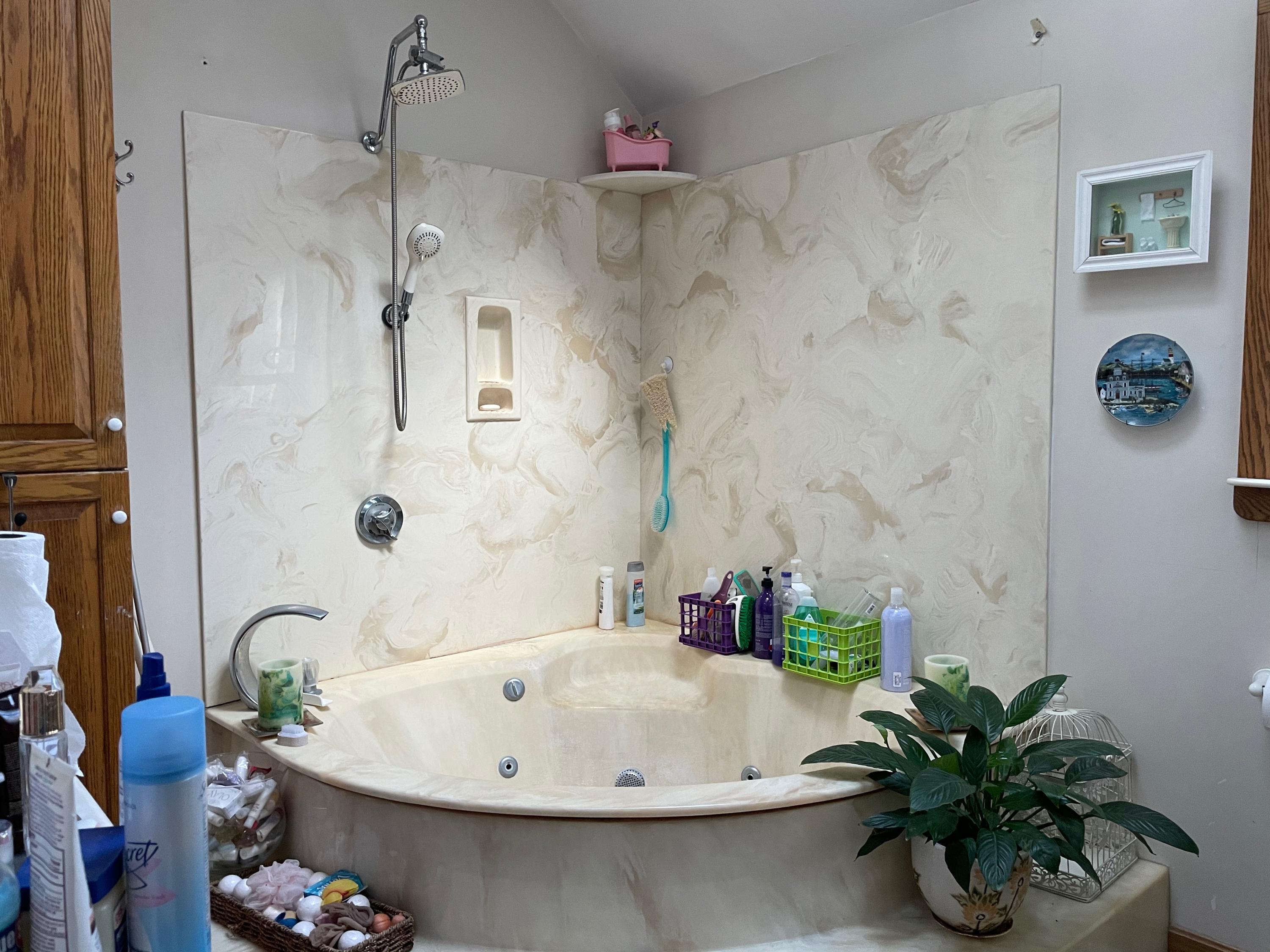 208 Lincoln Road Hyannis, MA 02601 - Photo 8 of 12 a white bath tub sitting next to a white sink