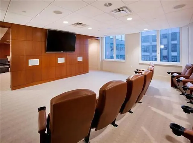 a view of a livingroom with furniture and window