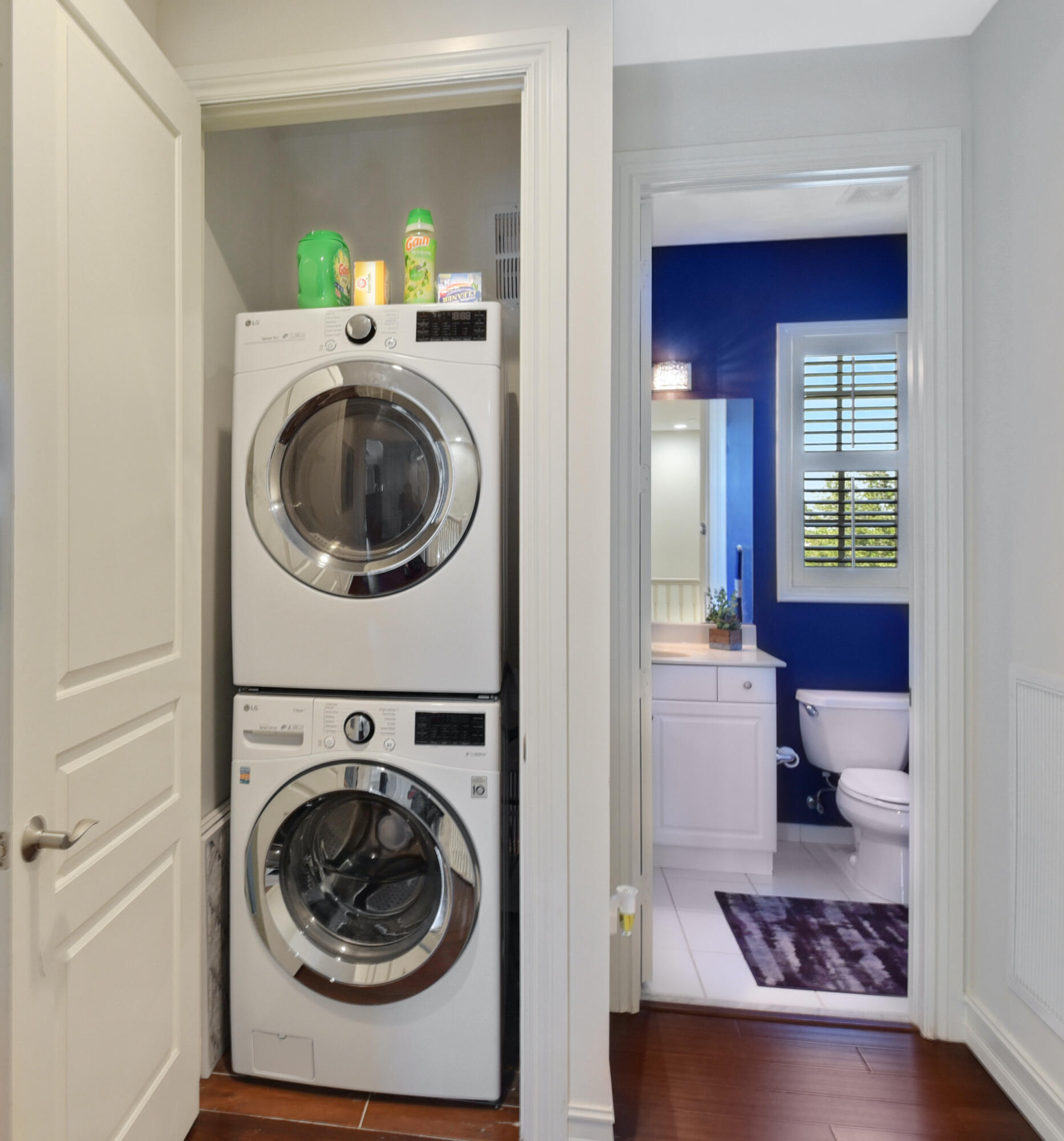609 Renaissance Way Delray Beach, FL 33483 - Photo 16 of 22 a view of a bedroom with washer and dryer