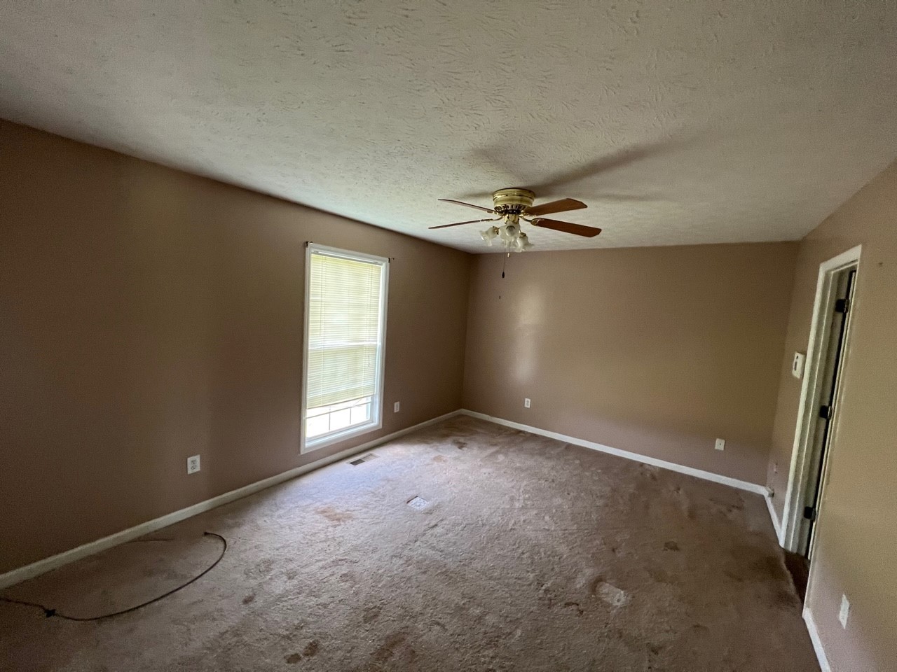 1058 Halls Mill Road Unionville, TN 37180 - Photo 20 of 32 a view of an empty room with a window