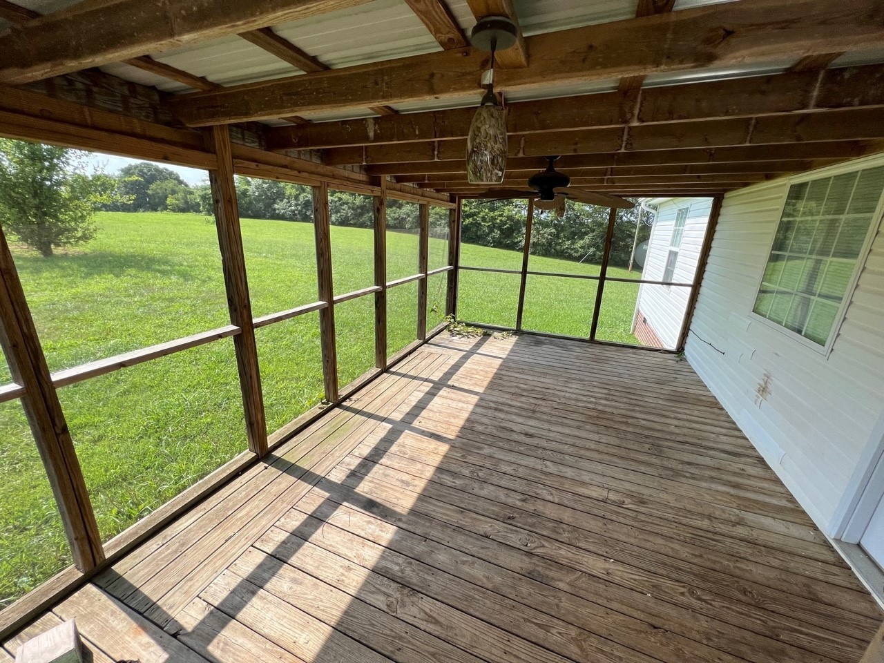 1058 Halls Mill Road Unionville, TN 37180 - Photo 22 of 32 a view of porch with wooden floor