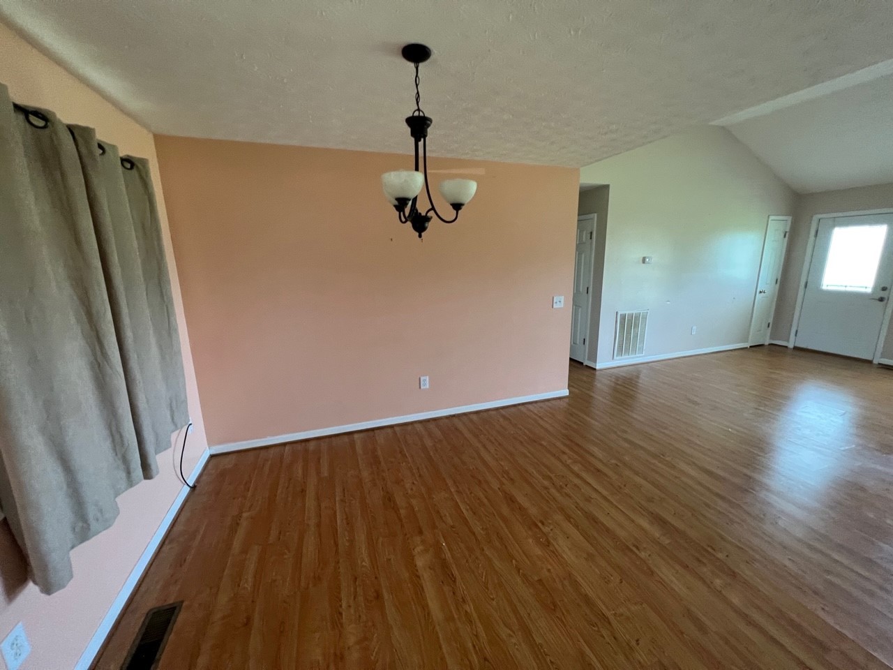 1058 Halls Mill Road Unionville, TN 37180 - Photo 26 of 32 wooden floor in an empty room with a window