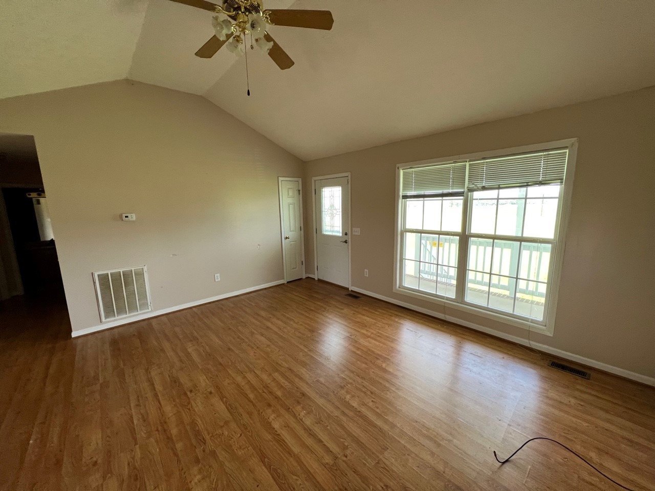 1058 Halls Mill Road Unionville, TN 37180 - Photo 29 of 32 wooden floor in an empty room with a window
