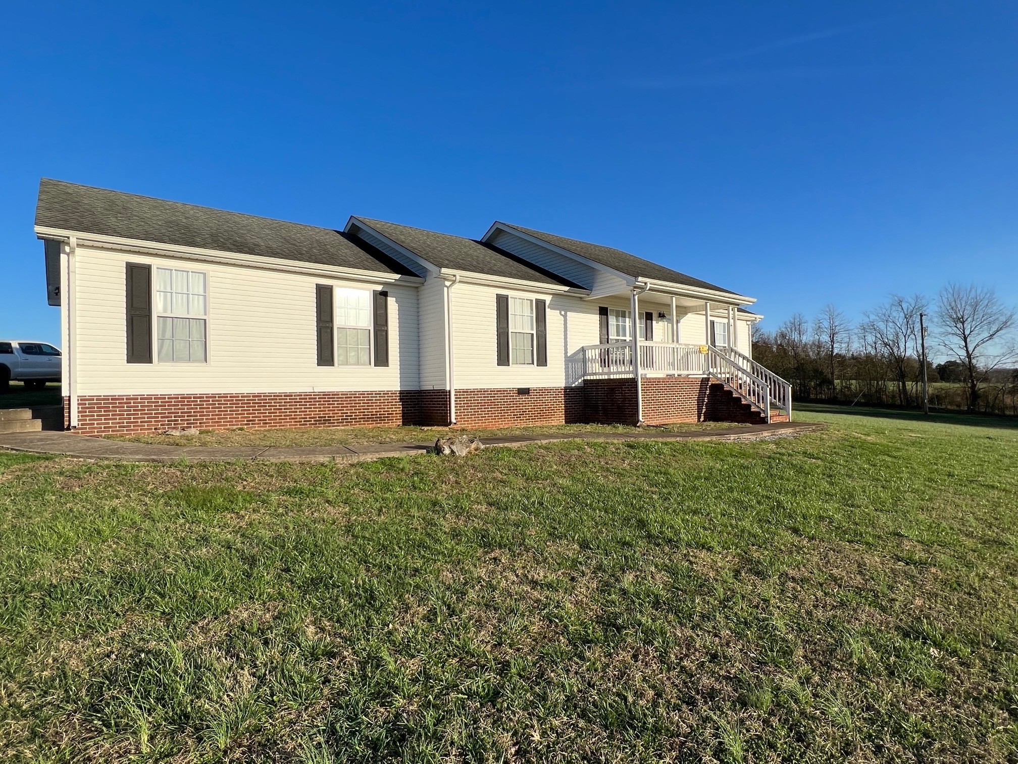 1058 Halls Mill Road Unionville, TN 37180 - Photo 3 of 32 a view of a house with a backyard