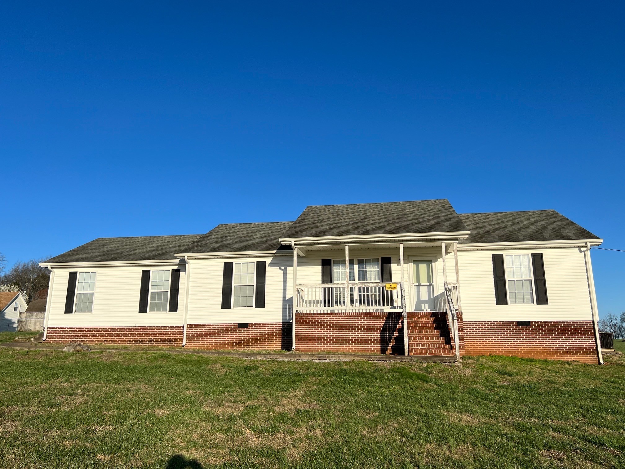 1058 Halls Mill Road Unionville, TN 37180 - Photo 6 of 32 a front view of a house with a garden