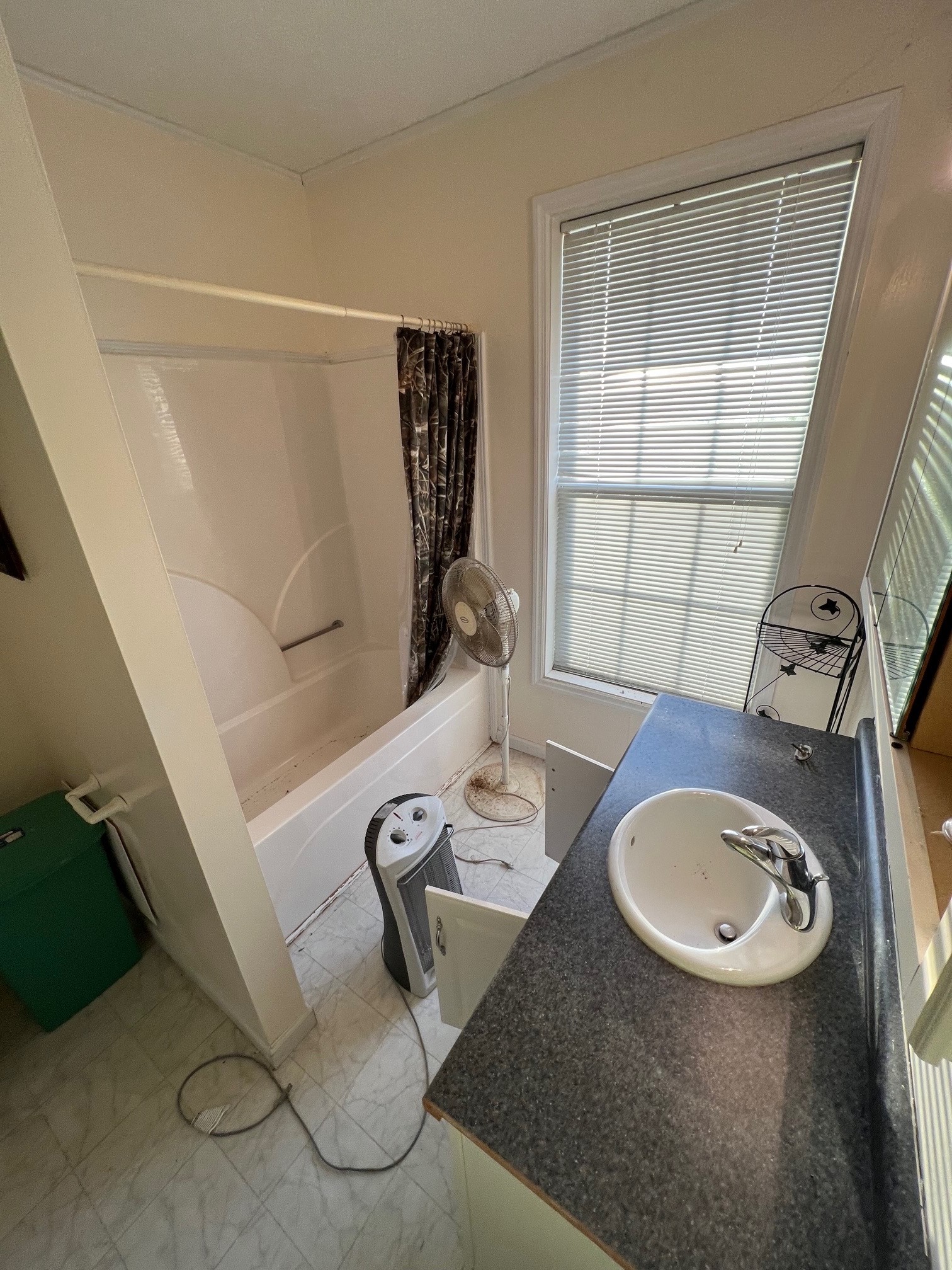 1058 Halls Mill Road Unionville, TN 37180 - Photo 9 of 32 a bathroom with a sink mirror vanity and window