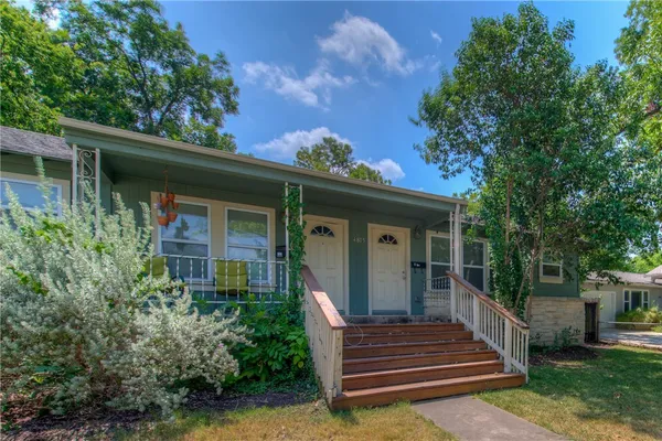 a front view of a house with a porch