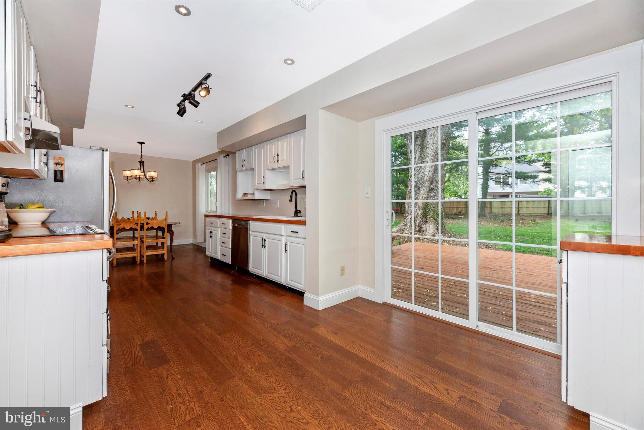 17405 Chiswell Road Poolesville, MD 20837 - Photo 11 of 63 Beautiful Sliding Doors out to a fenced yd