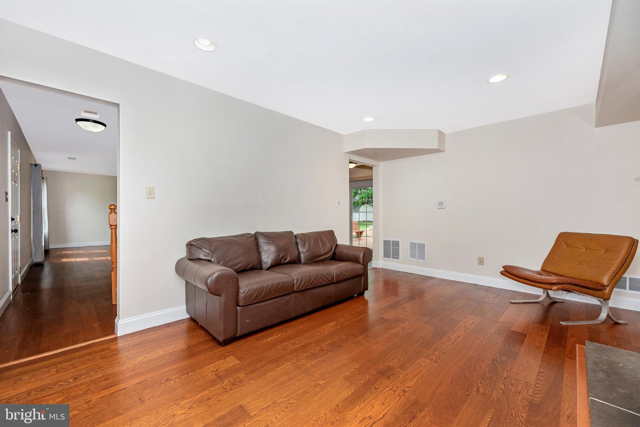 17405 Chiswell Road Poolesville, MD 20837 - Photo 19 of 63 Family Room with Brick Fireplace