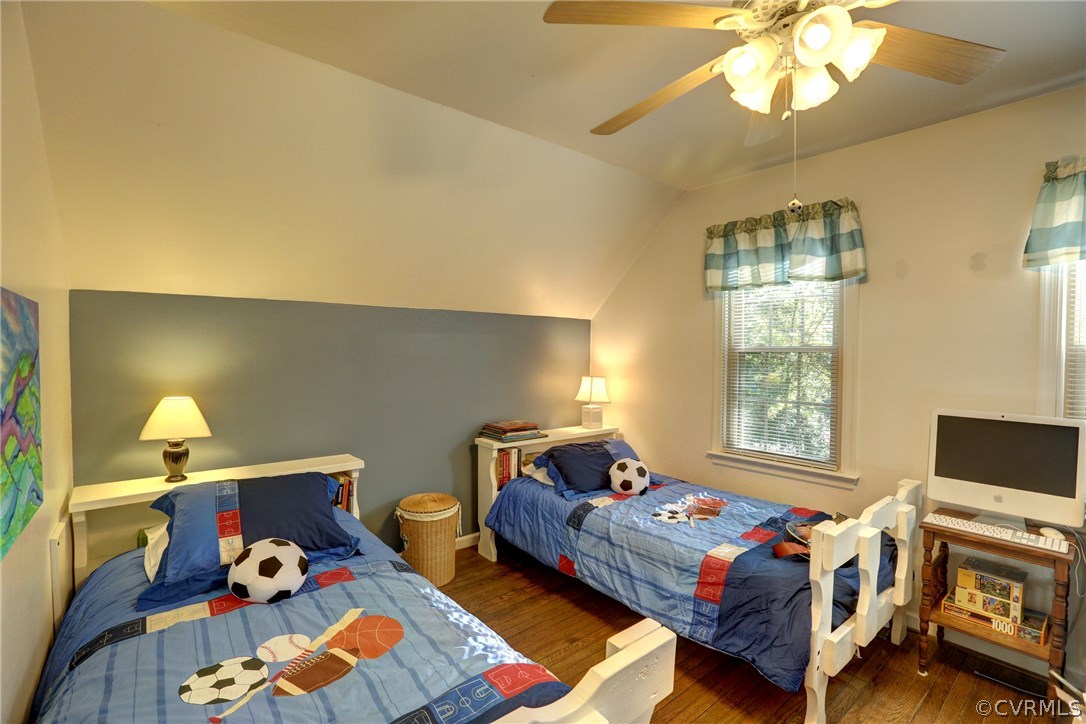 13301 Court Ridge Road Midlothian, VA 23112 - Photo 17 of 24 a bedroom with two beds and a chandelier