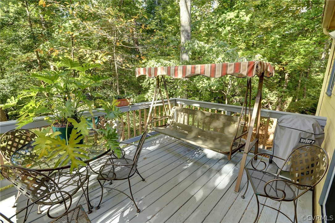 13301 Court Ridge Road Midlothian, VA 23112 - Photo 18 of 24 a view of balcony with wooden floor and outdoor seating