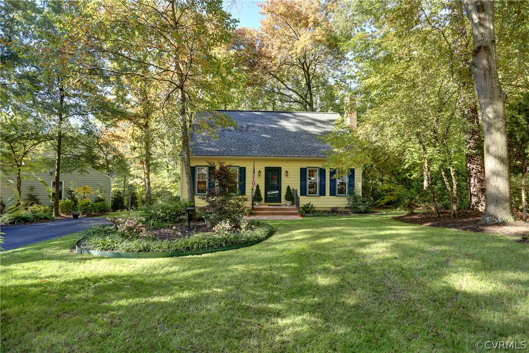 13301 Court Ridge Road Midlothian, VA 23112 - Photo 2 of 24 a front view of a house with a garden