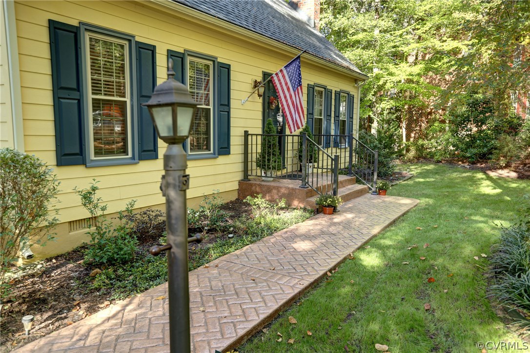 13301 Court Ridge Road Midlothian, VA 23112 - Photo 5 of 24 a front view of a house with garden