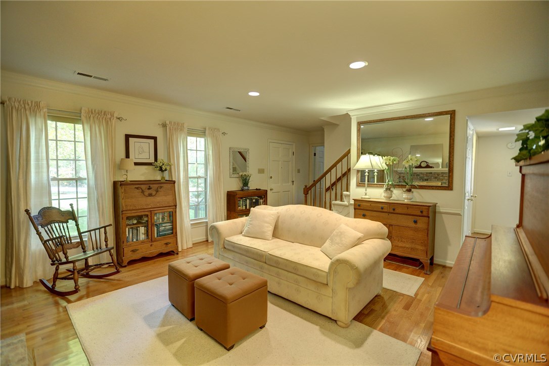 13301 Court Ridge Road Midlothian, VA 23112 - Photo 7 of 24 a living room with furniture and a flat screen tv